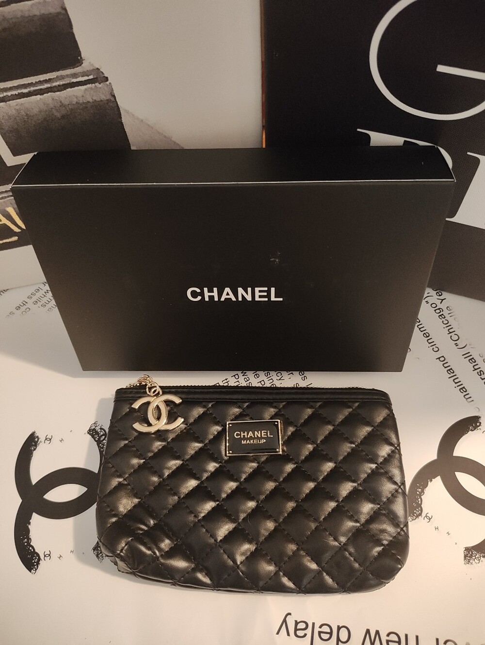 Iconic Logo Black Quilted Leather Cosmetic Pouch with Gold CC Charm